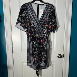 BloomChic Black and White Romper with Red Details